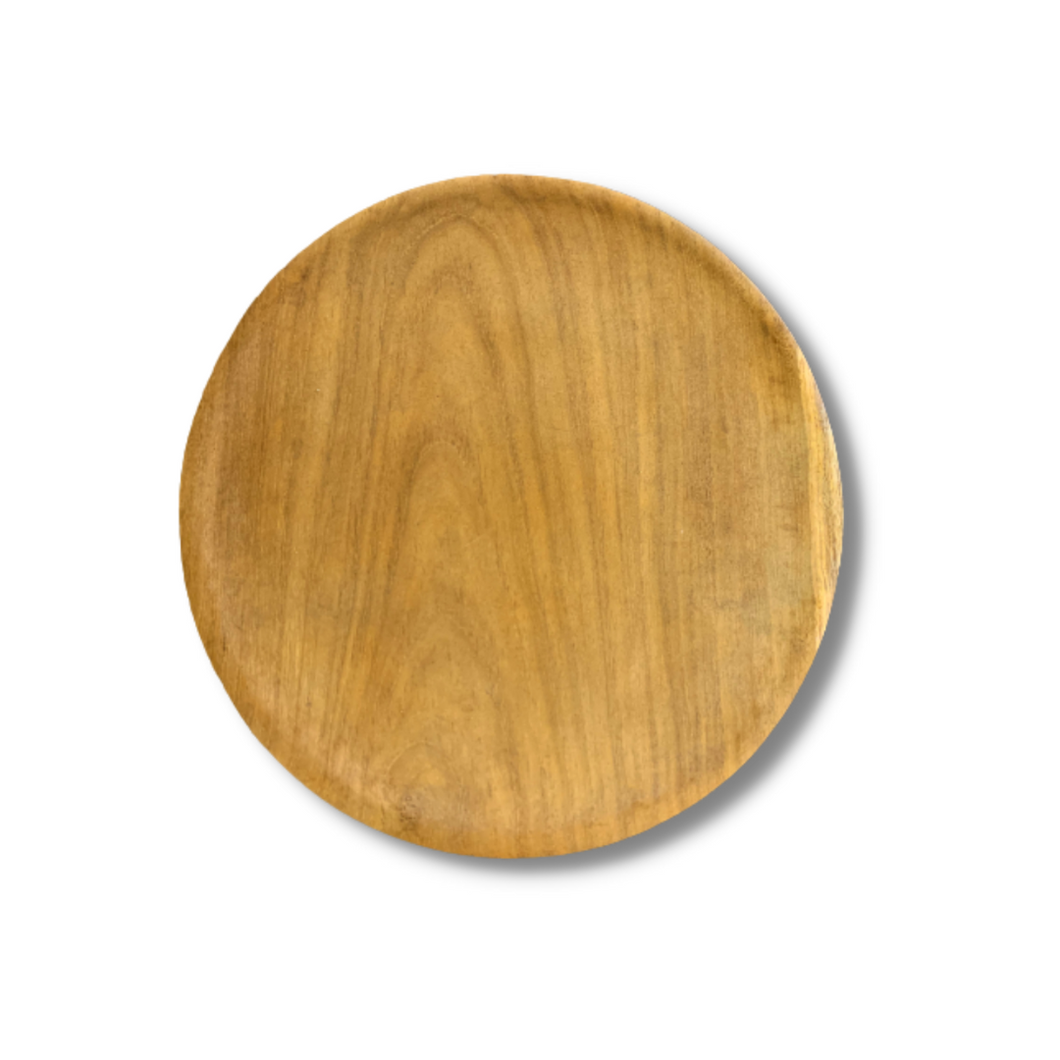 Nos assiettes rondes en bois de teck sont un investissement long terme. Cette assiette est faite avec un matériel durable et écologique
